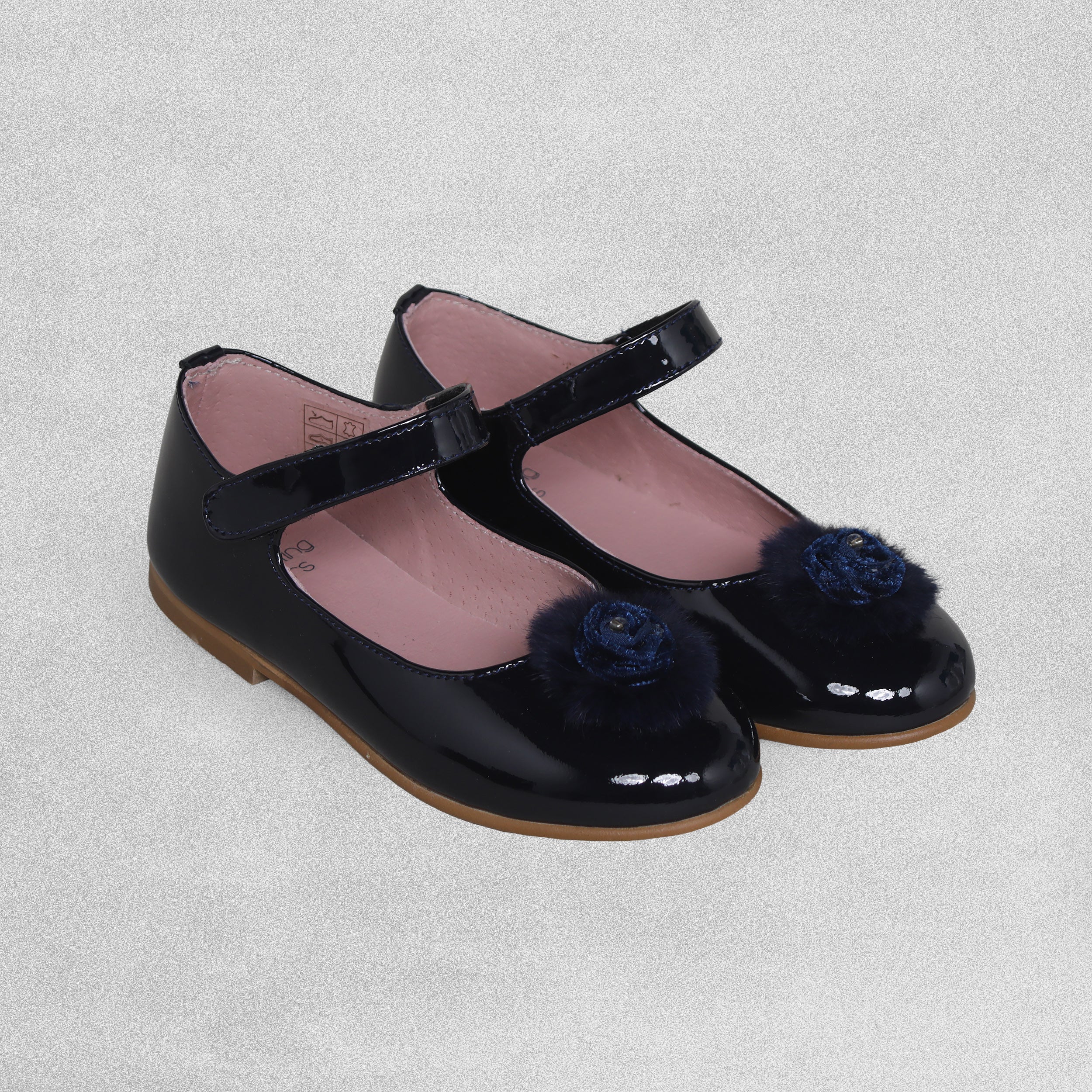 Shoeting Stars Dark Blue patent shoe with velcro strap and pom pom