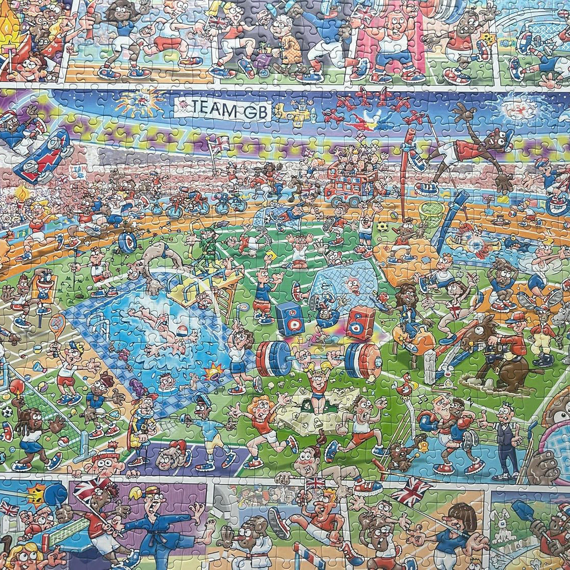 Gibsons Jokesaws Jigsaw Puzzle - 'Medals in the Making' - 1000 pieces