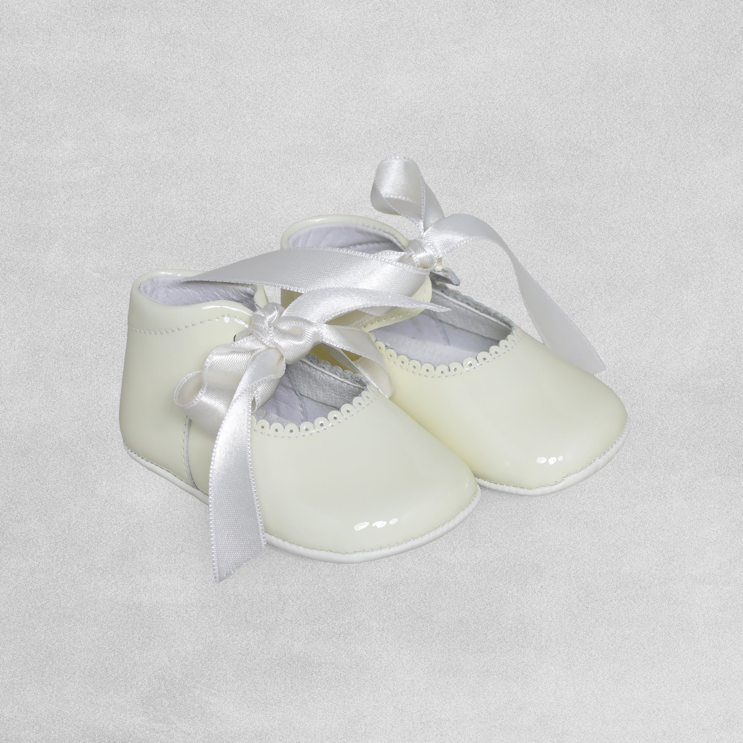 Shoeting Stars Cream Patent Leather Bootie with ribbon tie